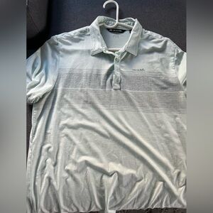 Travis Mathew light green shirt with gray pattern across chest